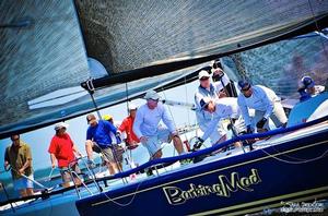 Skipper Jim Richardson (holding tiller) and the crew aboard Barking Mad posted results of second and third in two races on Friday and now hold the overall lead in the regatta photo copyright Sara Proctor http://www.sailfastphotography.com taken at  and featuring the  class