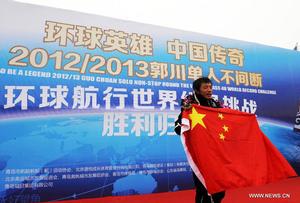 Guo Chuan - first Chinese solo non-stop circumnavigator - arrives home in Qingdao photo copyright Xinhua - China Daily taken at  and featuring the  class