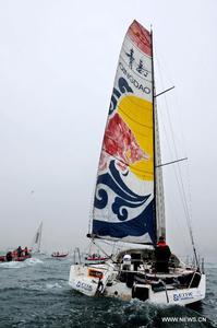 Guo Chuan - first Chinese solo non-stop circumnavigator - arrives home in Qingdao photo copyright Xinhua - China Daily taken at  and featuring the  class