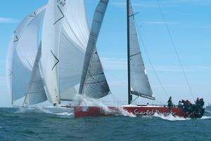 Scarlet Runner and Cougar II share the breeze to the finish line - TP52 Southern Cross Cup - Round Two photo copyright Teri Dodds http://www.teridodds.com taken at  and featuring the  class