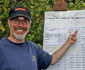 Bill Gibbs indicates corrected time  for his catamaran Afterburner that won the top President of USA Trophy and a 2-year Lexus IS F Sport lease  - 2013 Newport to Ensenada Yacht Race photo copyright Rich Roberts http://www.UnderTheSunPhotos.com taken at  and featuring the  class