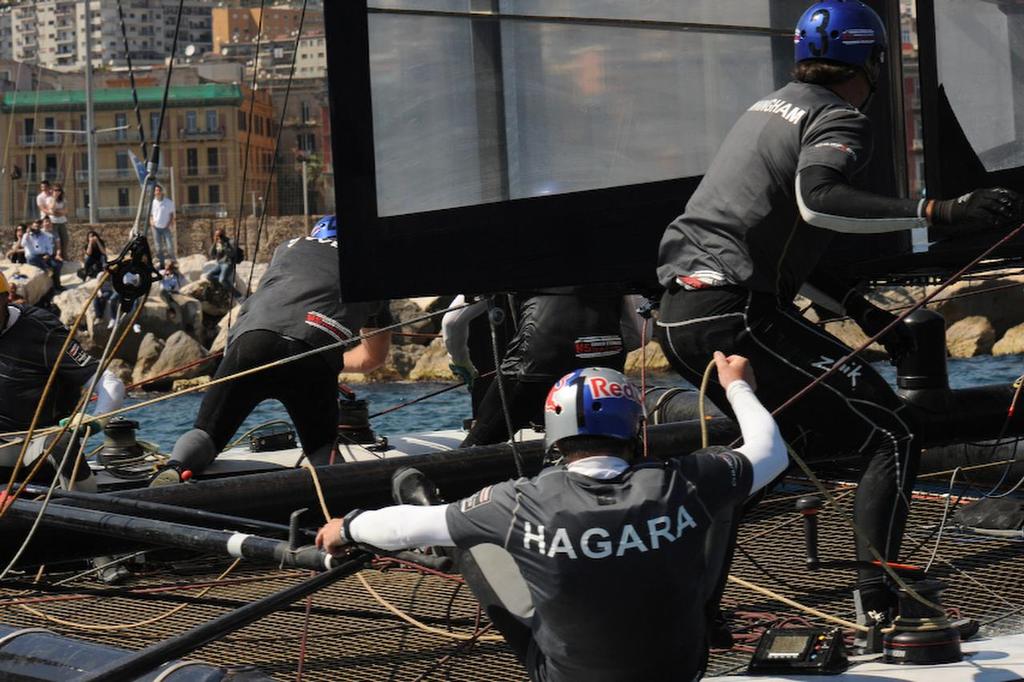 Helmsman Roman Hagara keeps his hand on the tiller as he rounds the starboard mark boat at the windward gate in the first fleet race of the day for the ACWS in Naples Italy where he places 8th out of nine boats on April 18, 2013. 




 photo copyright  SW taken at  and featuring the  class