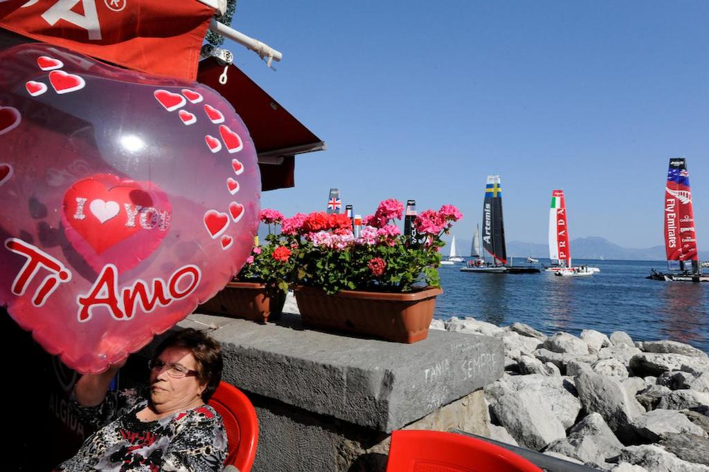 A shop on the street along the water’s edge says it all in Naples Italy.  ©  SW