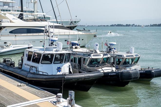 The San Francisco Marine Police boats wait for racing to start on the bay. © Paul Todd/Outside Images http://www.outsideimages.com