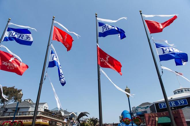 The America’s Cup flags fly at Pier 39.  © Paul Todd/Outside Images http://www.outsideimages.com