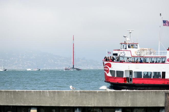 A view of the racing from Pier 39 with Luna Rossa skippered by Massimiliano Sirena (ITA) racing out on the America’s Cup race course.  © Paul Todd/Outside Images http://www.outsideimages.com