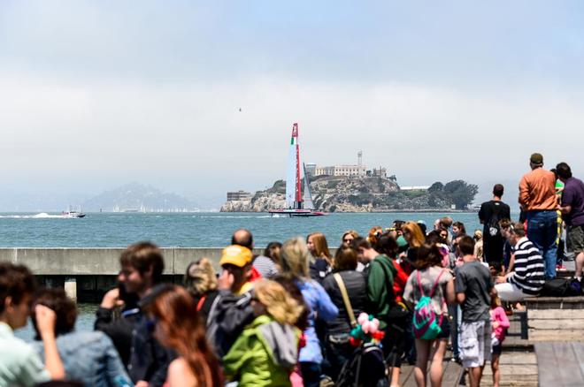 A view of the racing from Pier 39 with Luna Rossa skippered by Massimiliano Sirena (ITA) racing out on the America’s Cup race course. © Paul Todd/Outside Images http://www.outsideimages.com