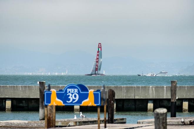 A view of the racing from Pier 39 with Luna Rossa skippered by Massimiliano Sirena (ITA) racing out on the America’s Cup race course.  © Paul Todd/Outside Images http://www.outsideimages.com