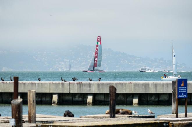 A view of the racing from Pier 39 with Luna Rossa skippered by Massimiliano Sirena (ITA) racing out on the America’s Cup race course.  © Paul Todd/Outside Images http://www.outsideimages.com