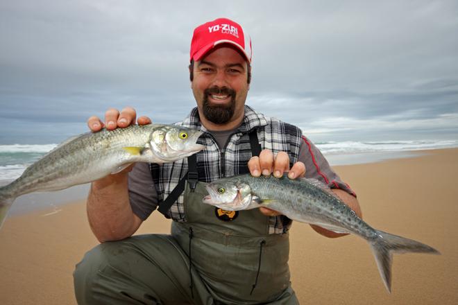 Gary displays two nice salmon which were spun up using metal slugs. © Jarrod Day