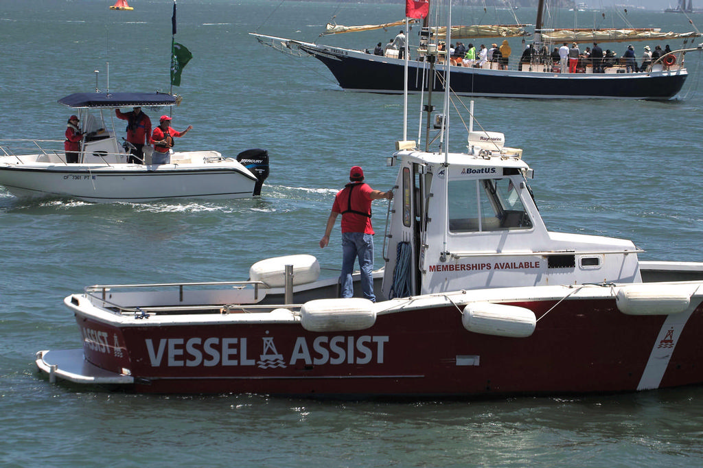 Even a Vessel Assist logo didn’t help this guy sneak into the restricted area.  - America’s Cup 2013 © Chuck Lantz http://www.ChuckLantz.com