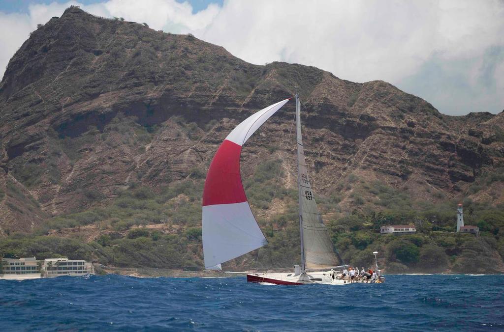 2013 Transpac yacht race - James Partridge’s Antrim 49 Rapid Transit riding a cloud puff into the finish. © Betsy Crowfoot/Ultimate Sailing