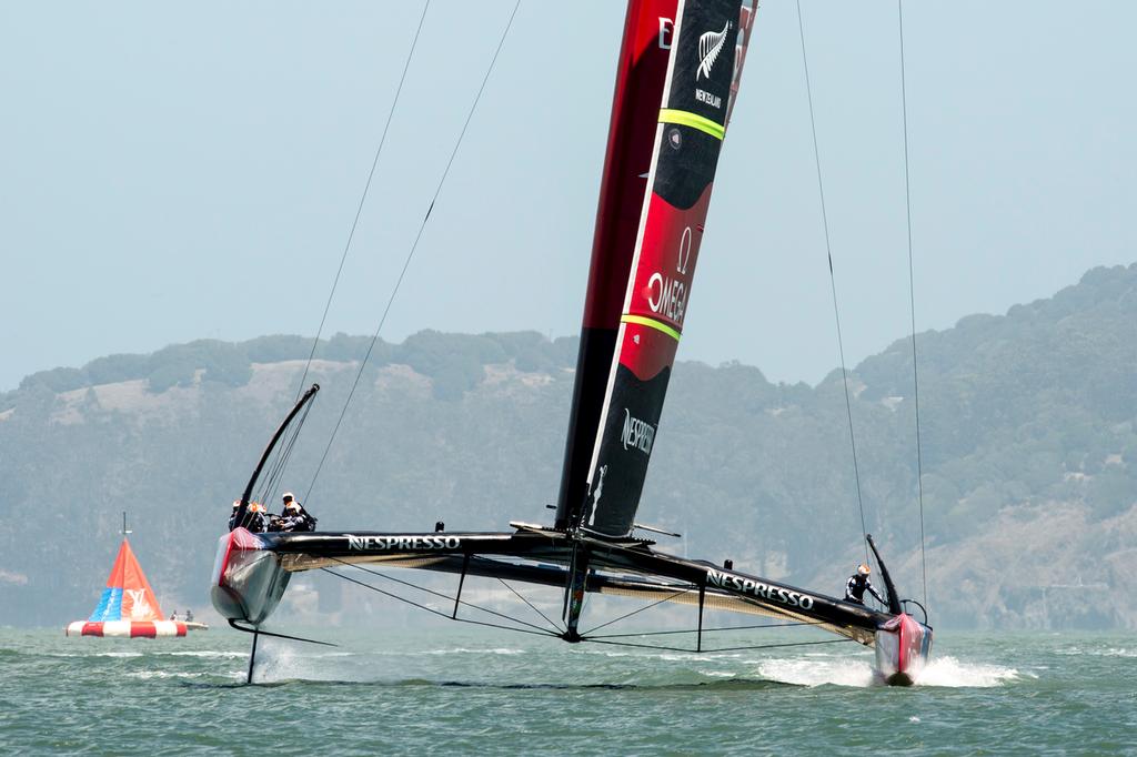 Emirates Team New Zealand approaching the top mark in their first real match of the Louis Vuitton Cup 2013 against and Lunna Rossa. 13/7/2013 © Chris Cameron/ETNZ http://www.chriscameron.co.nz