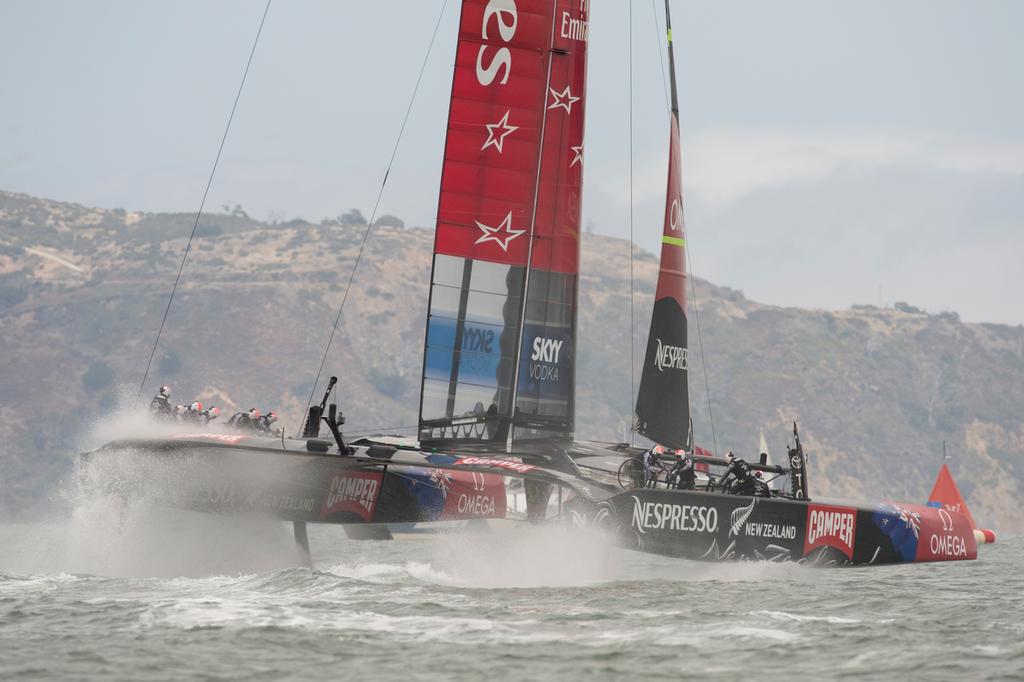 Emirates Team New Zealand sail around the course alone in their round robin 2 match of the Louis Vuitton Cup against Artemis Racing. 14/7/2013 photo copyright Chris Cameron/ETNZ http://www.chriscameron.co.nz taken at  and featuring the  class