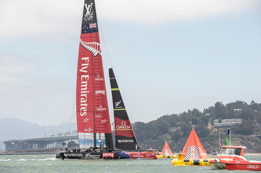 Emirates Team New Zealand cross the finish alone in their round robin 2 match of the Louis Vuitton Cup against Artemis Racing. 14/7/2013 photo copyright Chris Cameron/ETNZ http://www.chriscameron.co.nz taken at  and featuring the  class