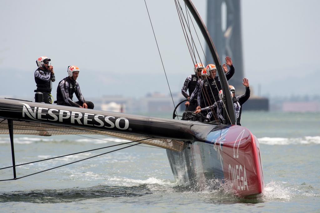 Emirates Team New Zealand wave to spectators after finishing their round robin 2 match of the Louis Vuitton Cup against Artemis Racing who were not sailing. 14/7/2013 © Chris Cameron/ETNZ http://www.chriscameron.co.nz