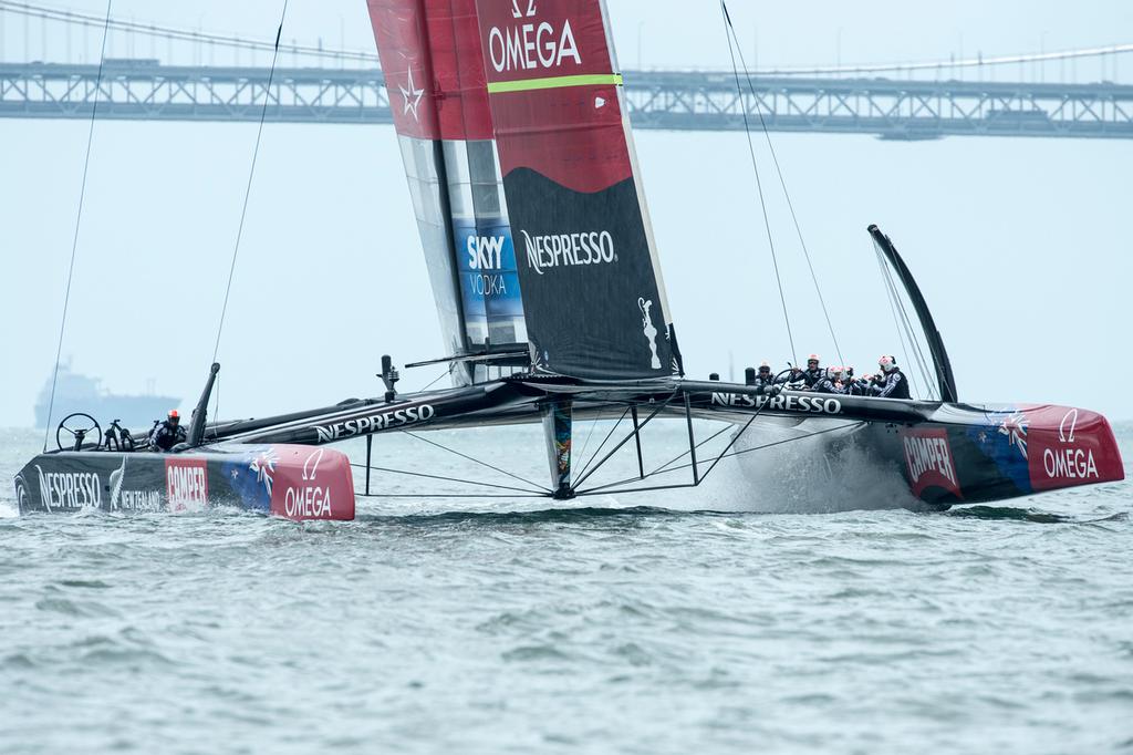 Emirates Team New Zealand AC72, NZL5 rounds the bottom mark well ahead of Luna Rossa in their Round Robin three match. Louis Vuitton Cup 2013. 21/7/2013 © Chris Cameron/ETNZ http://www.chriscameron.co.nz