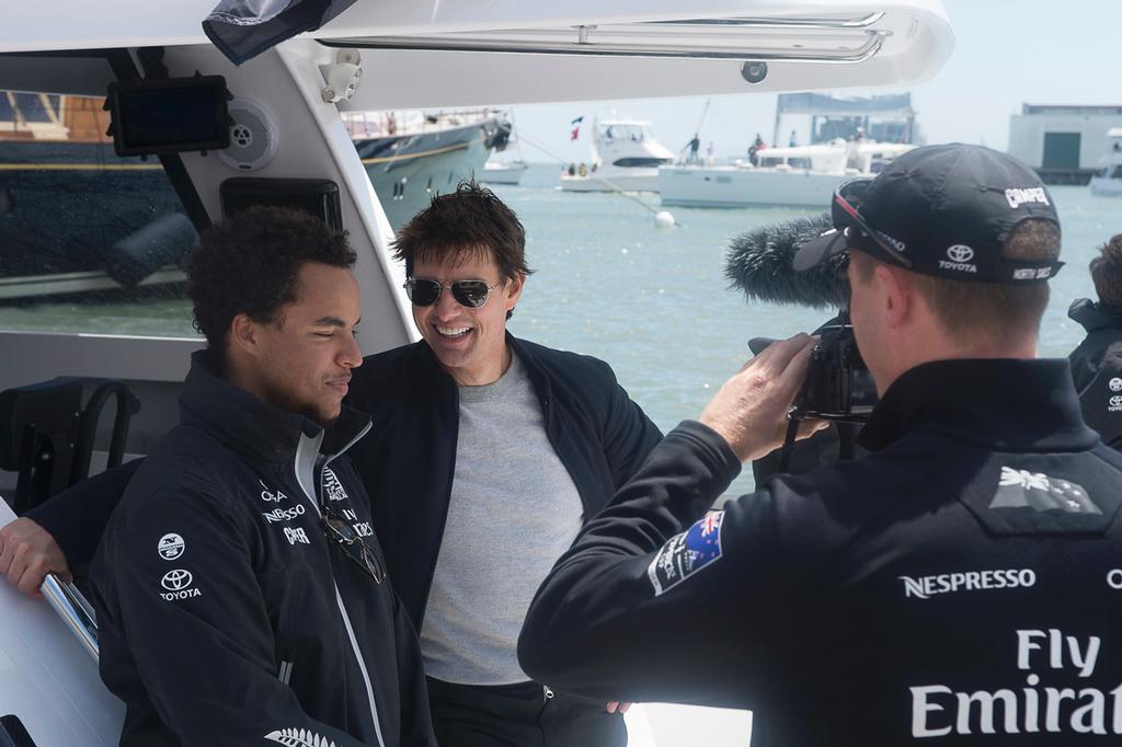 Tom Cruise and his son Conner relate their experience on NZL5 to Emirates Team New Zealand .  © Chris Cameron/ETNZ http://www.chriscameron.co.nz