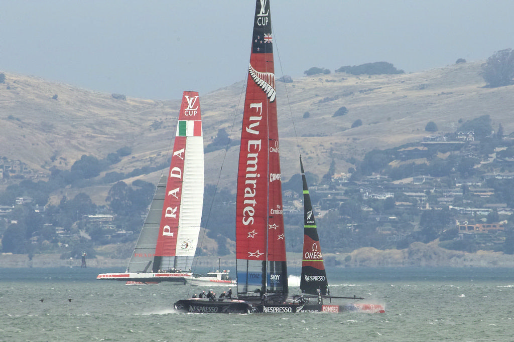 Prada practicing while ETNZ heads to the start of their by-match race.  - America's Cup © Chuck Lantz http://www.ChuckLantz.com