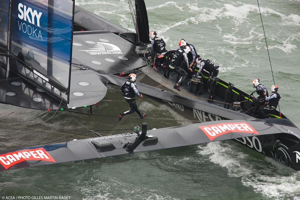 Tactician Ray Davies runs across to joing Glen Ashby, Louis Vuitton Cup - Race Day 12 - Emirates Team New Zealand photo copyright ACEA - Photo Gilles Martin-Raget http://photo.americascup.com/ taken at  and featuring the  class