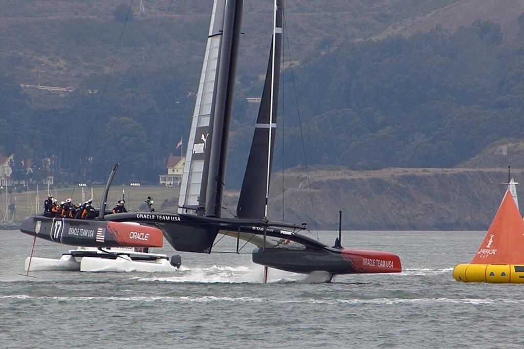 Oracle Team USA Boat 1 rounding the top mark during practice on the America’s Cup course July 23, 2013 photo copyright John Navas  taken at  and featuring the  class