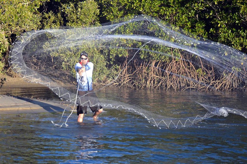 He then straightens the casting arm completely once it’s pointed at the target but continues to rotate and bring his spare hand, which still holds the net, around. Once turned almost a full 180 degrees he releases the net with the spare hand. photo copyright Lee Brake taken at  and featuring the  class