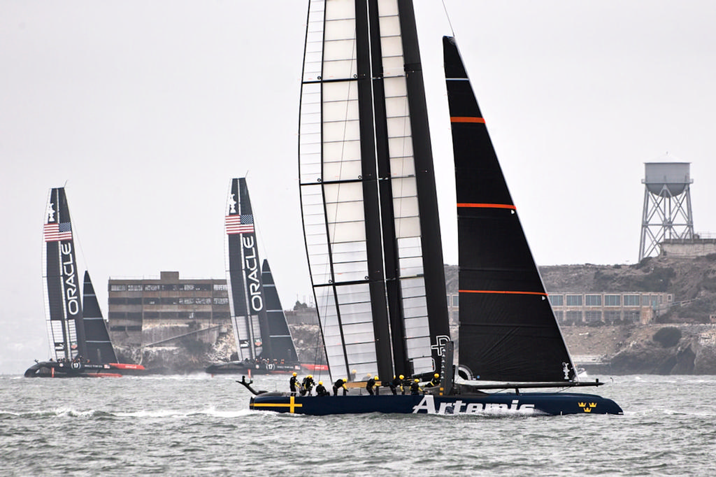 Artemis in the foreground. Oracle 1 and 2 in the backgound. Al Capone’s former home in the far background. - America’s Cup © Chuck Lantz http://www.ChuckLantz.com