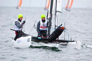 Thursday 19th July 2012 - Dublin Bay, Ireland:  Australia's Paul Darmanin (helm) and Lucy Copeland (crew) in the SL16 catamaran class at the ISAF Youth World Sailing Championships sponsored by Four Star Pizza on Dublin Bay, Ireland..Photograph: David Branigan/ISAF.... photo copyright  David Branigan / ISAF http://www.sailing.org taken at  and featuring the  class