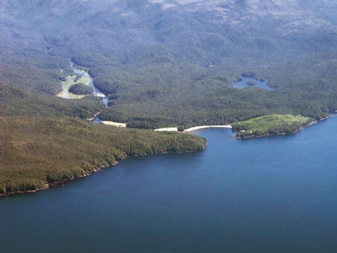 The beautiful small bay at the mouth of the Koeye River has a nice sand beach but is open to westerly winds.  Sam Beebe, Ecotrust Canada - Kwakume Inlet, British Columbia © Anne Vipond and William Kelly