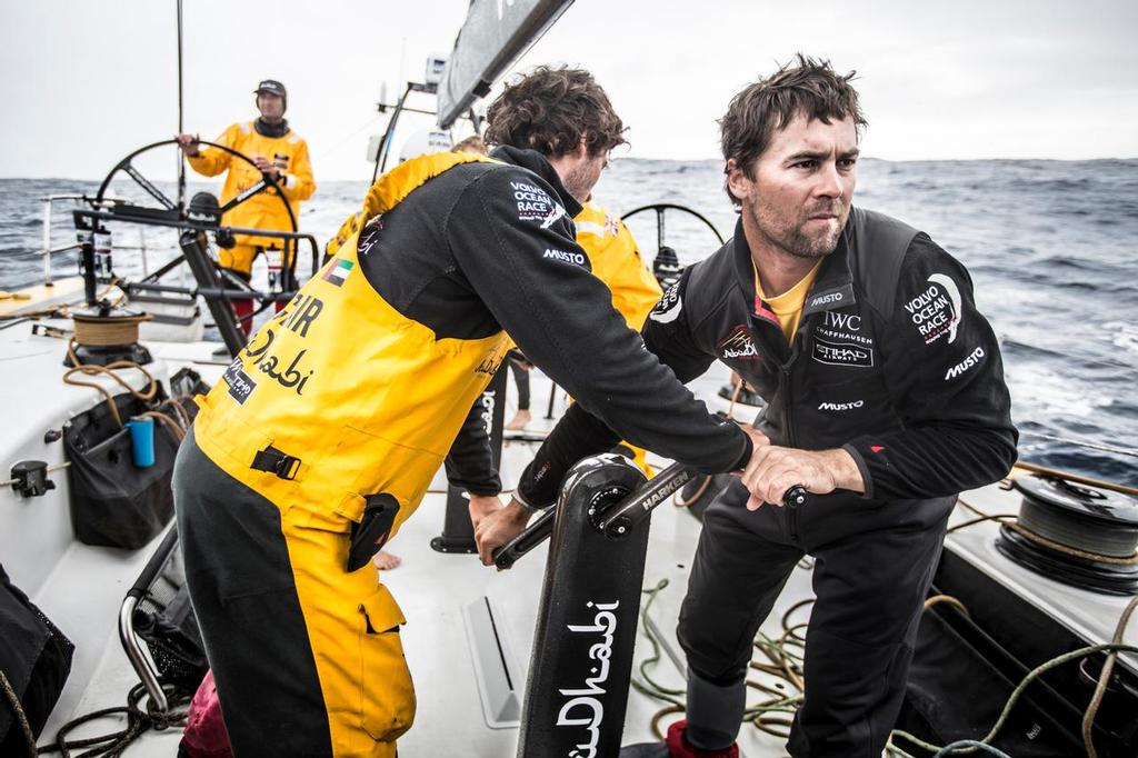March 21, 2015. Leg 5 to Itajai onboard Abu Dhabi Ocean Racing. Day 03.  Daryl Wislang wakes up to man the pumps as the team hoists a different headsail in the light winds. photo copyright Matt Knighton/Abu Dhabi Ocean Racing taken at  and featuring the  class