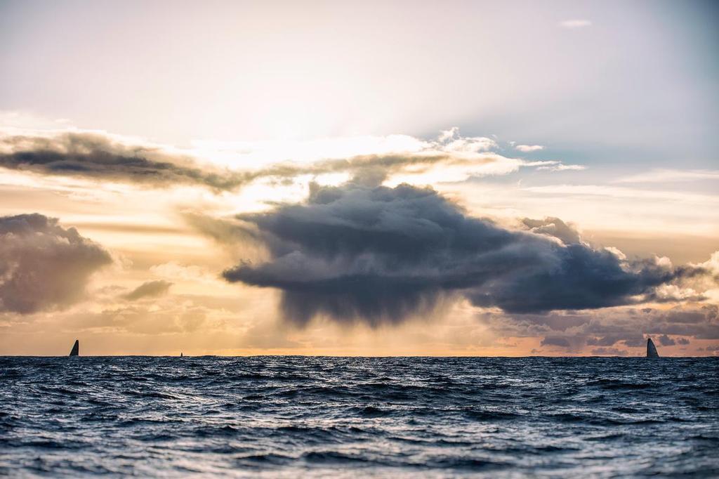 Mapfre, Brunel, and Abu Dhabi appear on the horizon at sundown - Team Alvimedica ©  Amory Ross / Team Alvimedica