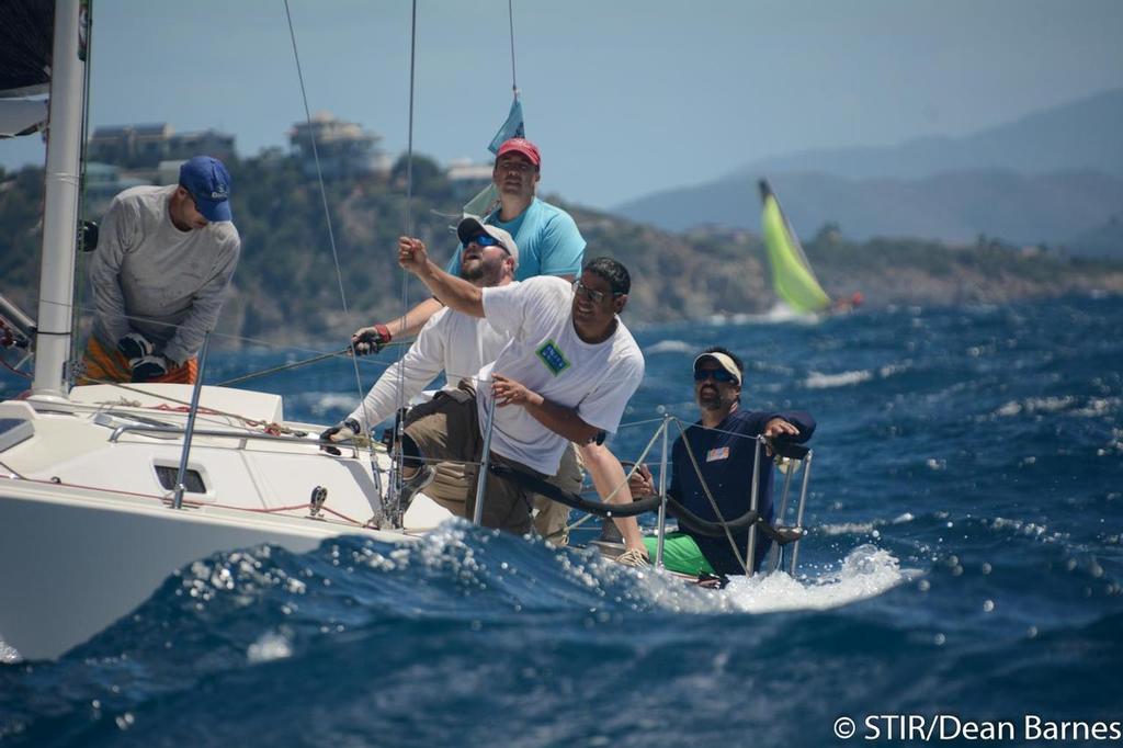 The crew of Dark Star, a J/105 owned by Jonathan Lipuscek, look as if they were swallowed by a wave while racing down the south side of St. Thomas to Charlotte Amalie Harbor. © Dean Barnes