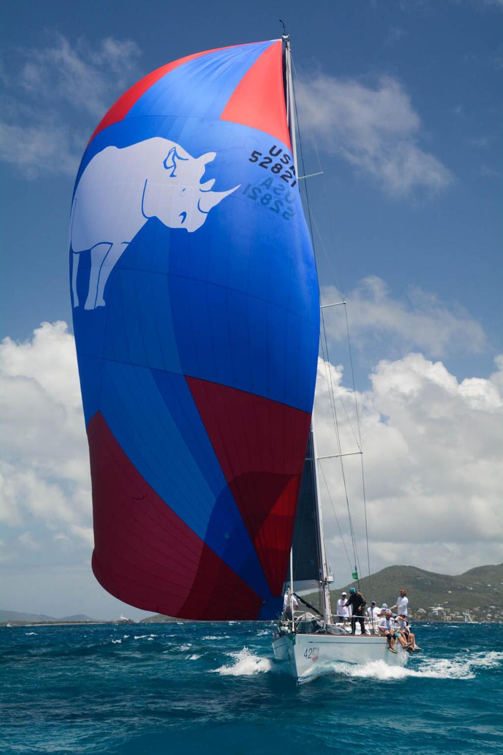 White Rhino, the USA Todd Stuart’s Swan 56, flies downwind under spinnaker. Credit: Dean Barnes © Dean Barnes