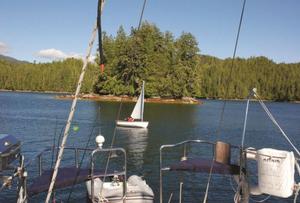 A light breeze in Kwakume Inlet provides perfect conditions for dinghy sailing. Ocean Cruise Guides - Kwakume Inlet, British Columbia photo copyright Anne Vipond and William Kelly taken at  and featuring the  class
