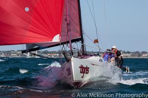 Tigris powering along under their big red spinnaker, but it wasn’t always so pretty for them… - 2014-15 Club Marine Series photo copyright  Alex McKinnon Photography http://www.alexmckinnonphotography.com taken at  and featuring the  class