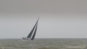 Grey sky? and dri?zzing ra?in in So?uth Chin?a Sea - Round Hainan Regatta 2015 photo copyright Juerg Kaufmann Round Hainan Regatta taken at  and featuring the  class
