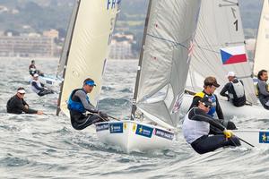 Giles Scott (centre) photo copyright Thom Thow Photography taken at  and featuring the  class