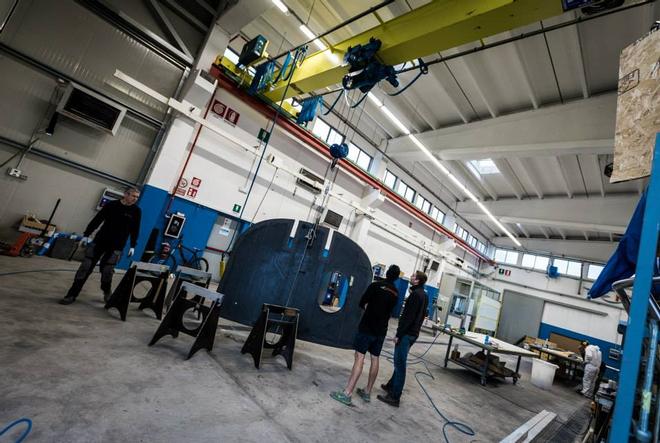 Bulkheads being trimmed before fitting into hull - April 2015 - Team Vestas Wind rebuild at Persico Marine, Bergamo. Italy © Brian Carlin - Team Vestas Wind