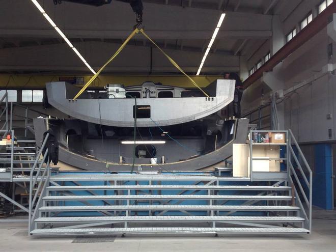 Hull lifted clear - April 2015 - Team Vestas Wind rebuild at Persico Marine, Bergamo. Italy © Brian Carlin - Team Vestas Wind