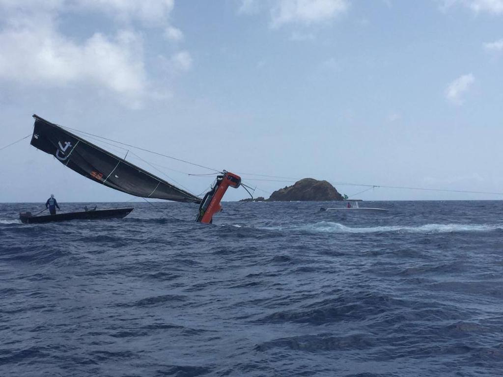 G4 being righted at St Barths © Sharon Green/ ultimatesailing.com http://www.ultimatesailing.com