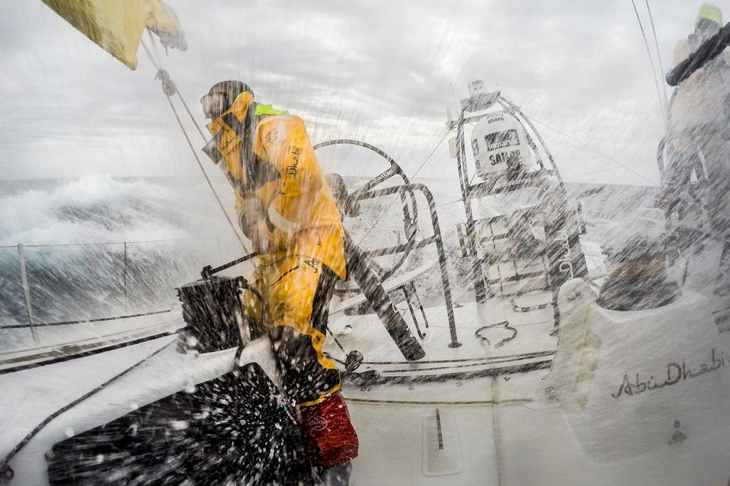 April 1, 2015. Leg 5 to Itajai onboard Abu Dhabi Ocean Racing. Day 14.  Upwind spray engulfs the cockpit as Luke 