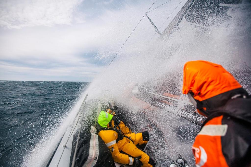 April 1, 2015. Leg 5 to Itajai onboard Team Alvimedica. Day 15. Conditions worsen as the fleet outuns a nasty system of low pressure moving east off the coast of South America, with upwind sailing in 35-40 knots of wind creating uncomfortable sailing. Dave Swete driving upwind in wet and rough conditions. ©  Amory Ross / Team Alvimedica