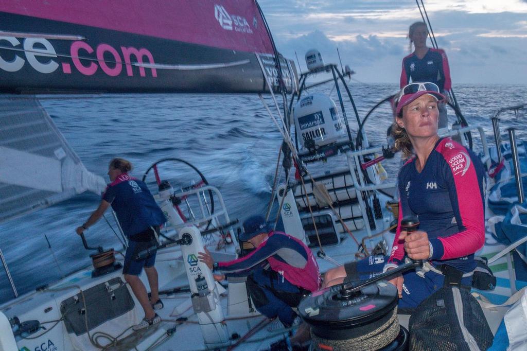 April 20, 2015. Leg 6 to Newport onboard Team SCA. Day 1. Carolijn Bouwer looks over her shoulder at the other boats. © Corinna Halloran / Team SCA