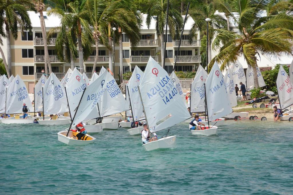 Over 80 Optimists line up on the beach in front of the St. Thomas Yacht Club.  © Dean Barnes