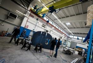 Bulkheads being trimmed before fitting into hull - April 2015 - Team Vestas Wind rebuild at Persico Marine, Bergamo. Italy photo copyright Brian Carlin - Team Vestas Wind taken at  and featuring the  class