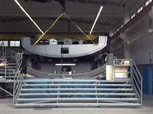 Hull lifted clear - April 2015 - Team Vestas Wind rebuild at Persico Marine, Bergamo. Italy photo copyright Brian Carlin - Team Vestas Wind taken at  and featuring the  class