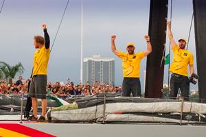 Luke 'Parko' Parkinson, skipper Ian Walker and Onboard Reporter Matt Knighton celebrate Azzam's landmark Volvo Ocean Race leg five victory - Volvo Ocean Race 2015 photo copyright  Ian Roman / Abu Dhabi Ocean Racing taken at  and featuring the  class