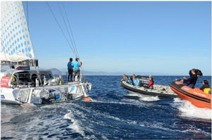 We Are Water - skippers Bruno and Willy Garcia crossing the finish line in fifth place - Barcelona World Race 2015 photo copyright  Mireia Perello taken at  and featuring the  class