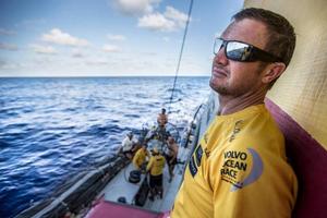 Onboard Abu Dhabi Ocean Racing – Phil Harmer jumps up to the boom to get a better view over the horizon of the competition - Leg six to Newport – Volvo Ocean Race 2015 photo copyright Matt Knighton/Abu Dhabi Ocean Racing taken at  and featuring the  class