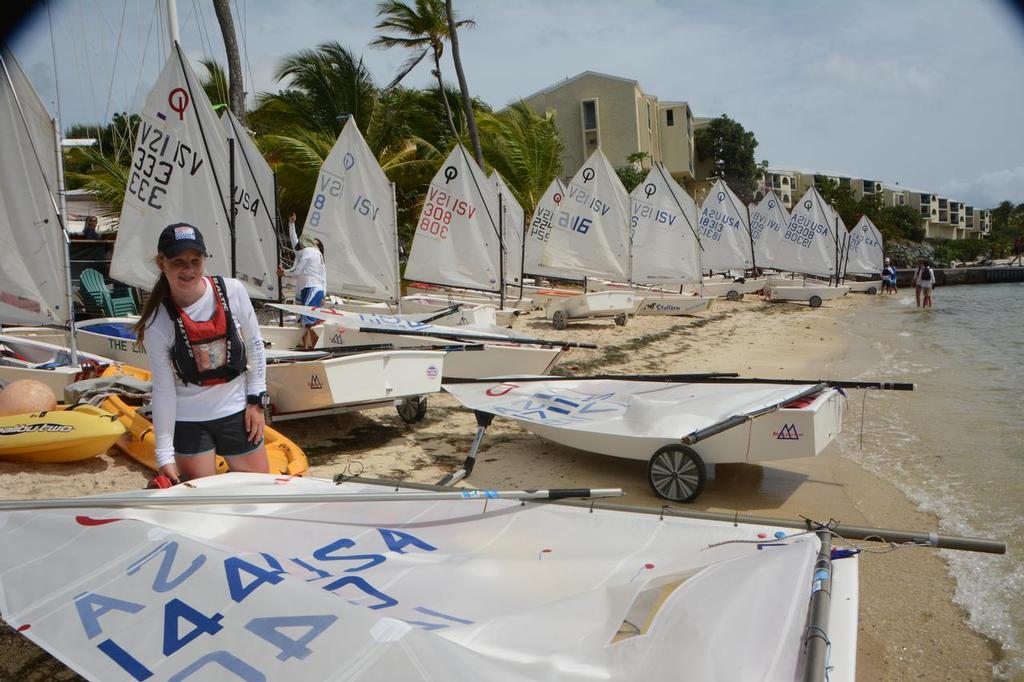 Optimists lined up ready to race on the beach in front of the St. Thomas Yacht Club. © Dean Barnes